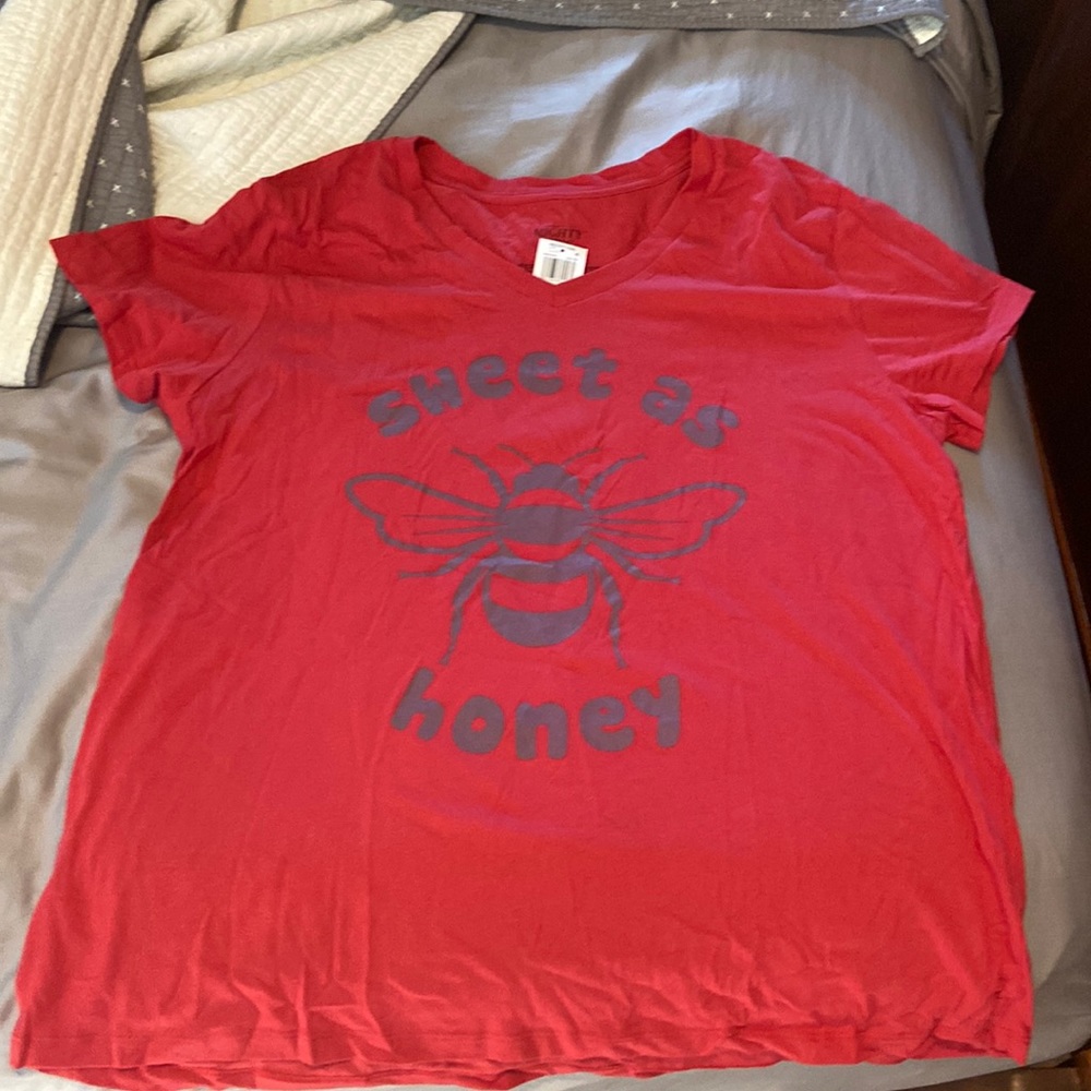 Woman’s T shirt brand new.  Mighty Fine